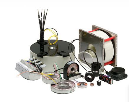 Toroidal low frequency laminated transformers